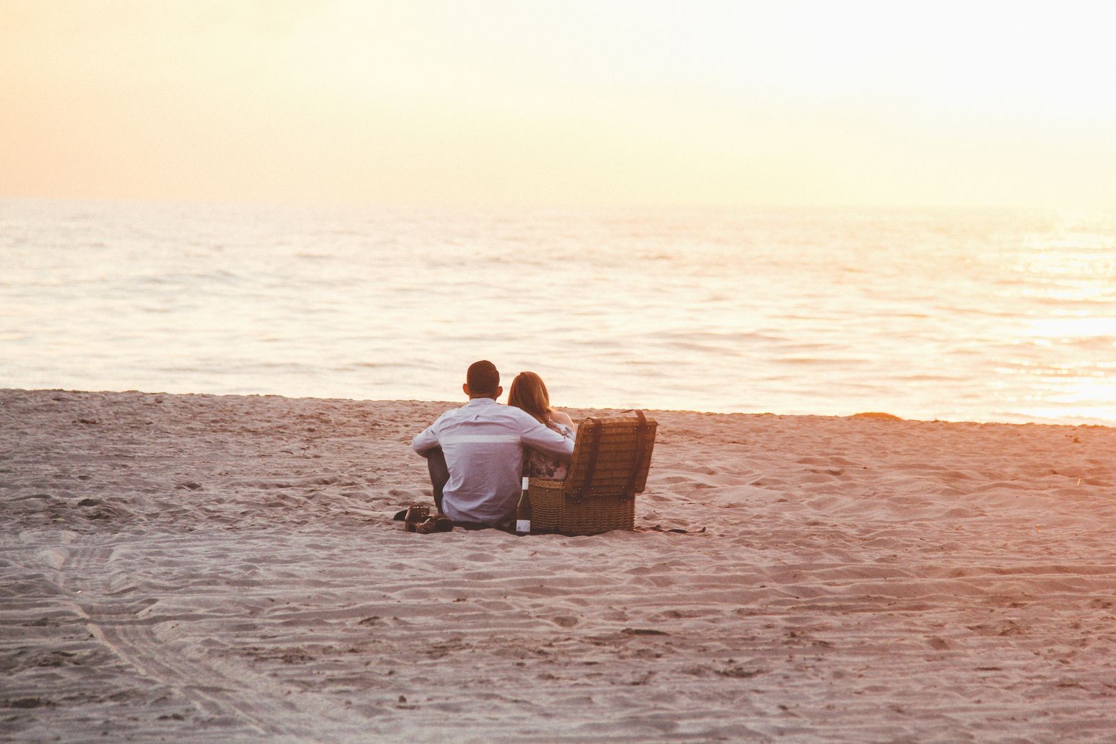 A lightweight soft cooler bag on a sunny beach
