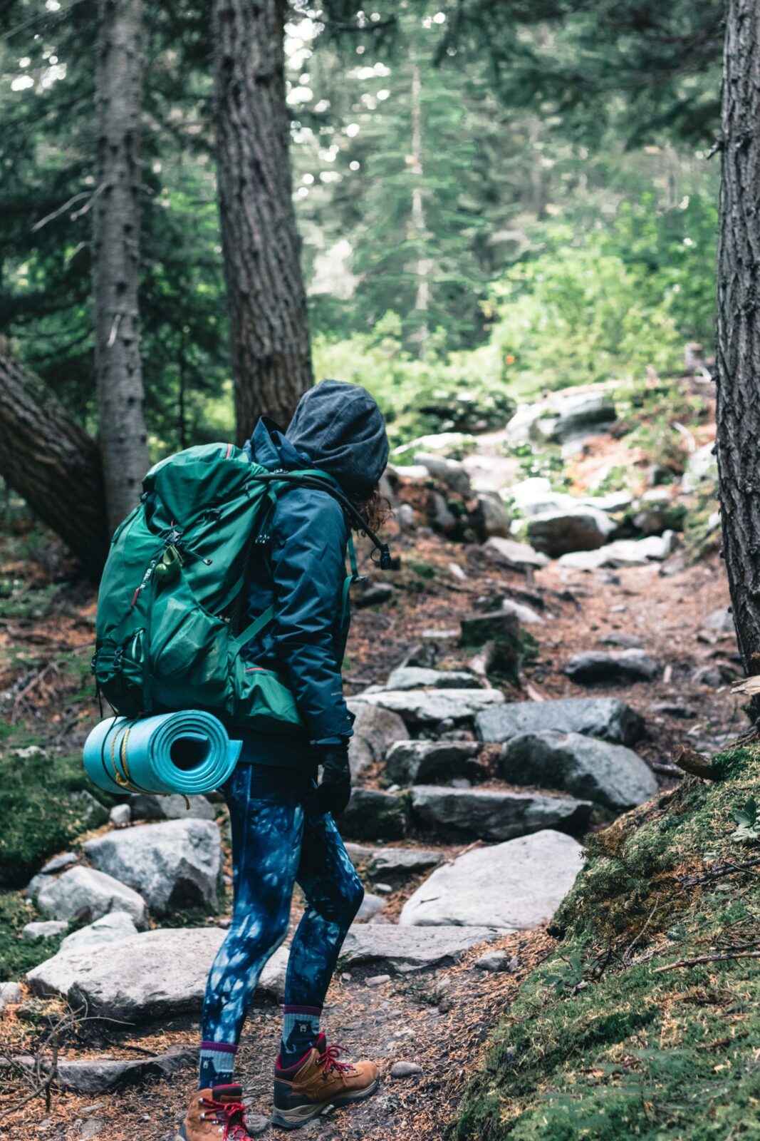 Person carrying a comfortable padded travel backpack with a fitted harness