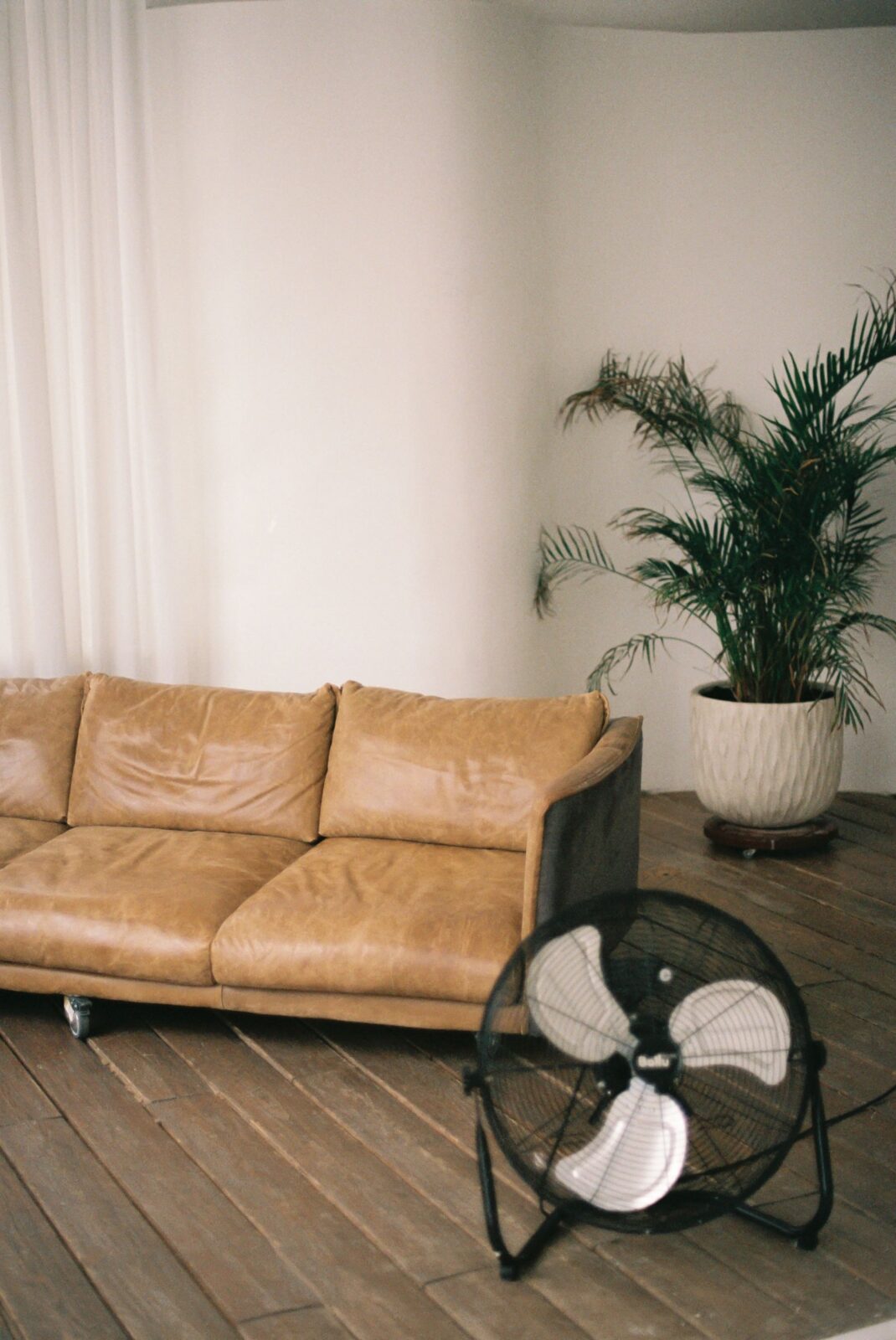 Modern cooling fan in a bright contemporary living room