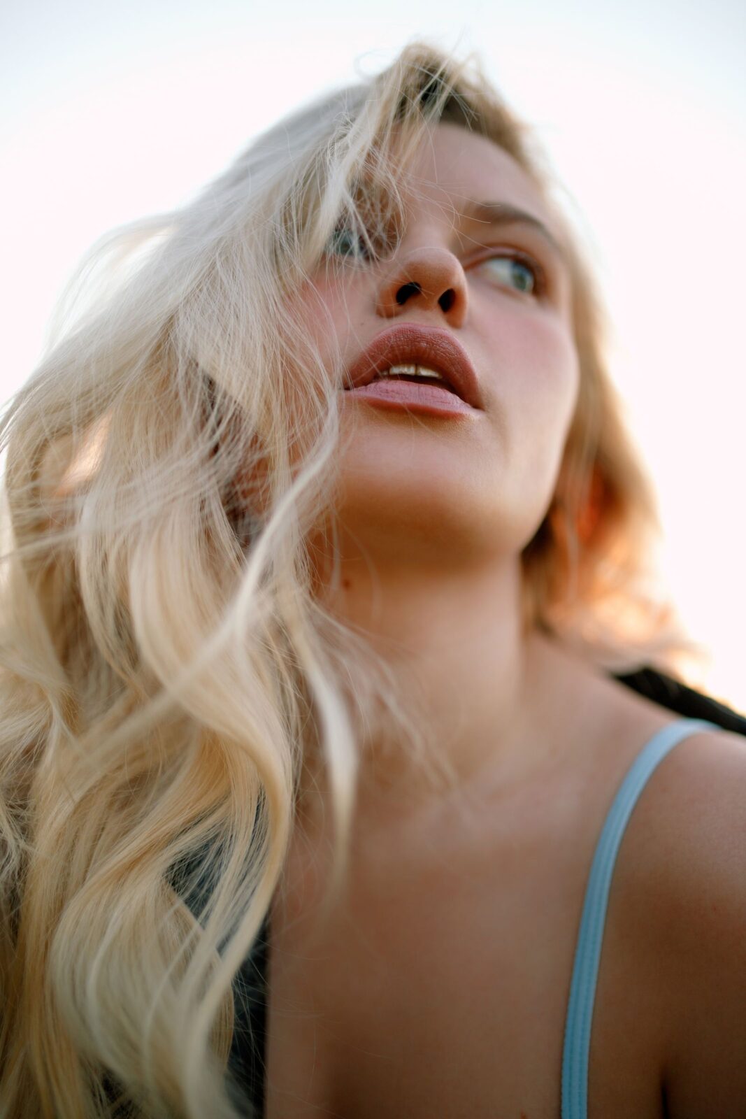 A woman with soft undone beachy waves