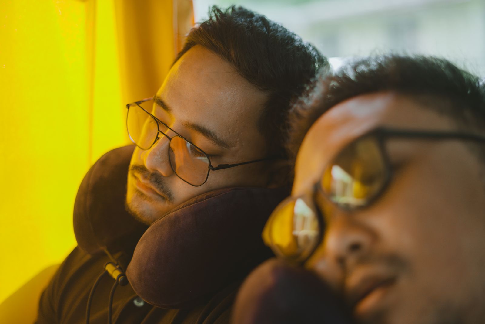 A compact inflatable travel pillow packed into a small pouch