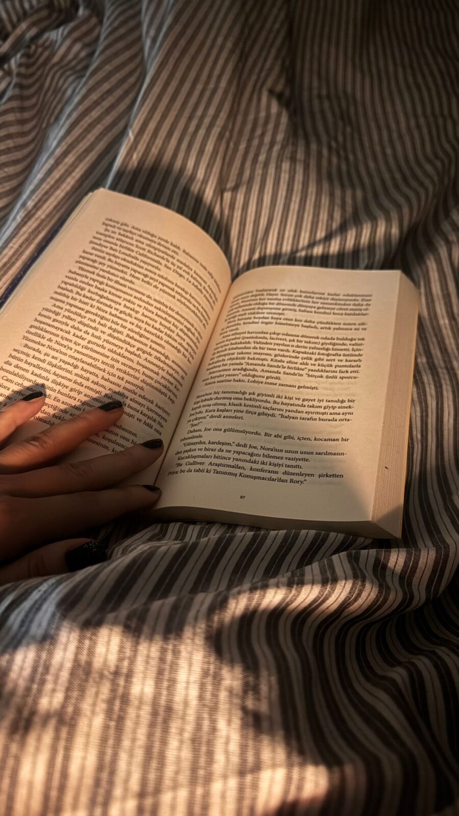 Cozy reading in bed with a device