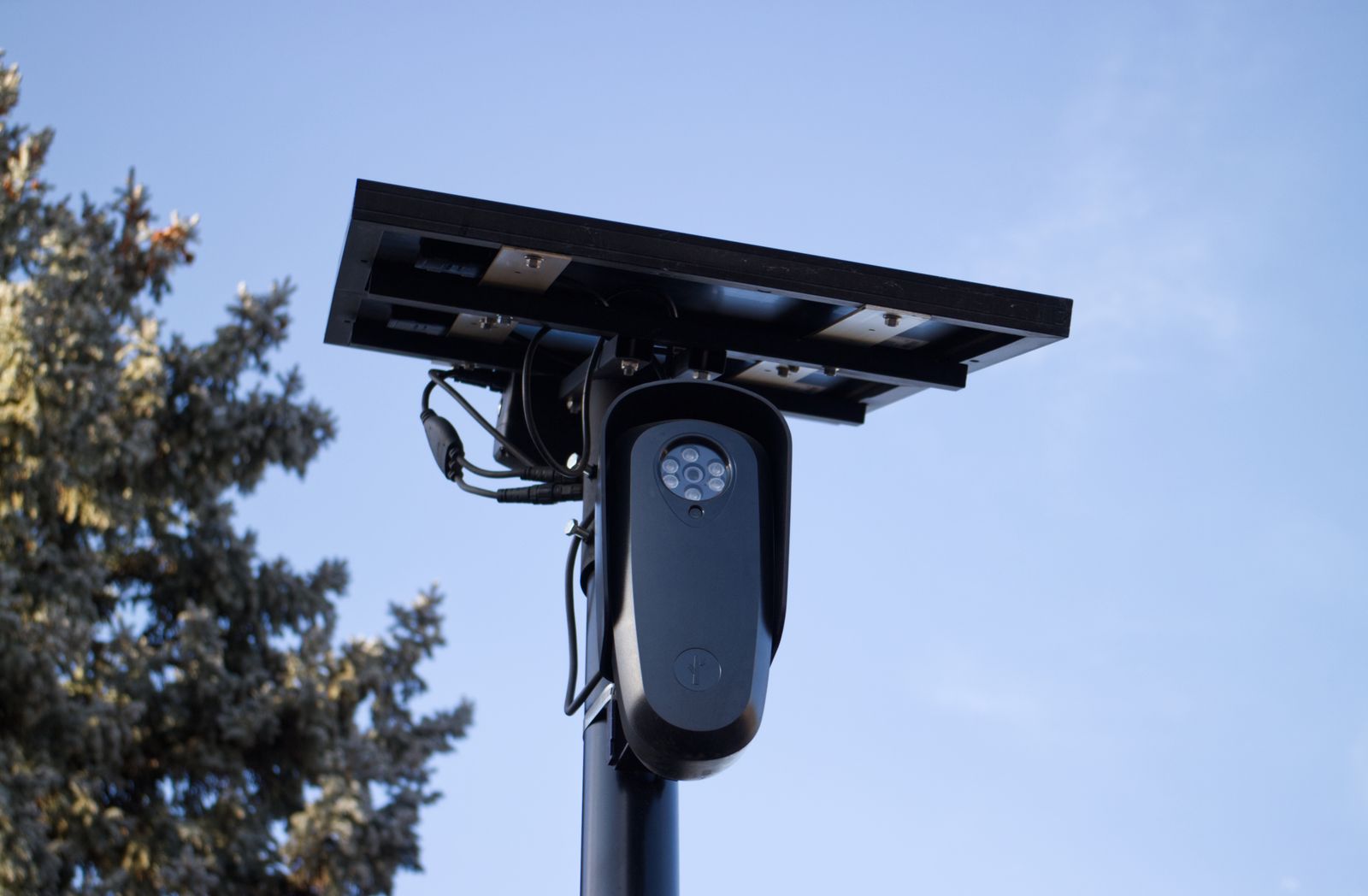 Wire-free outdoor surveillance camera with a solar panel