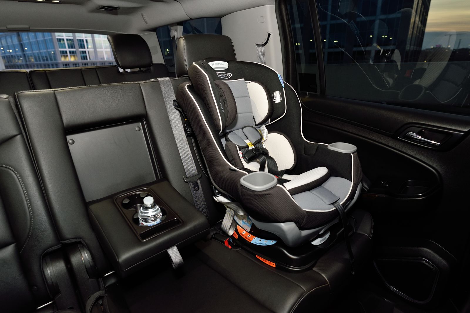 Child safety car seat securely installed in the back seat of a vehicle