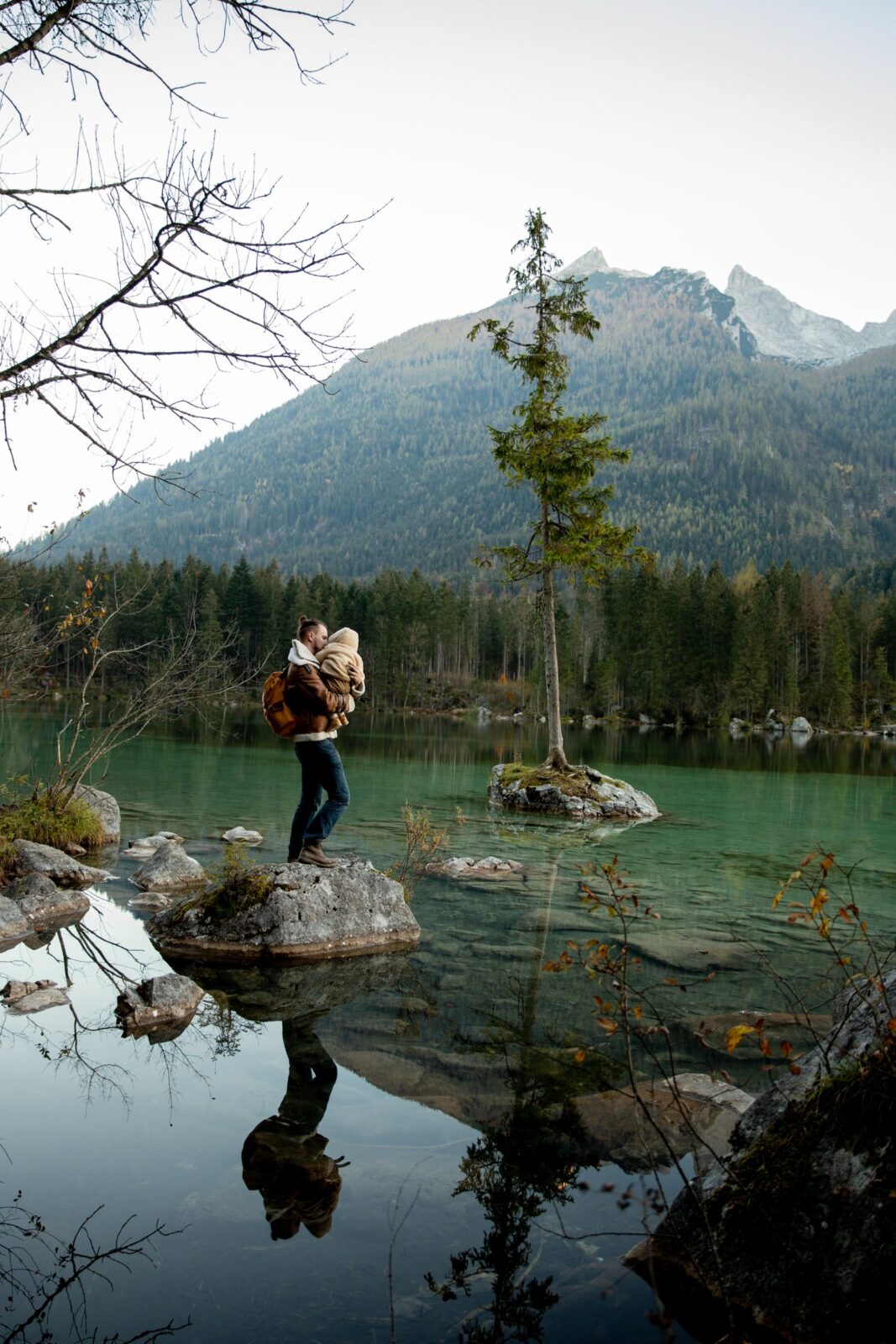 Parent holding a baby close to the chest for comfort