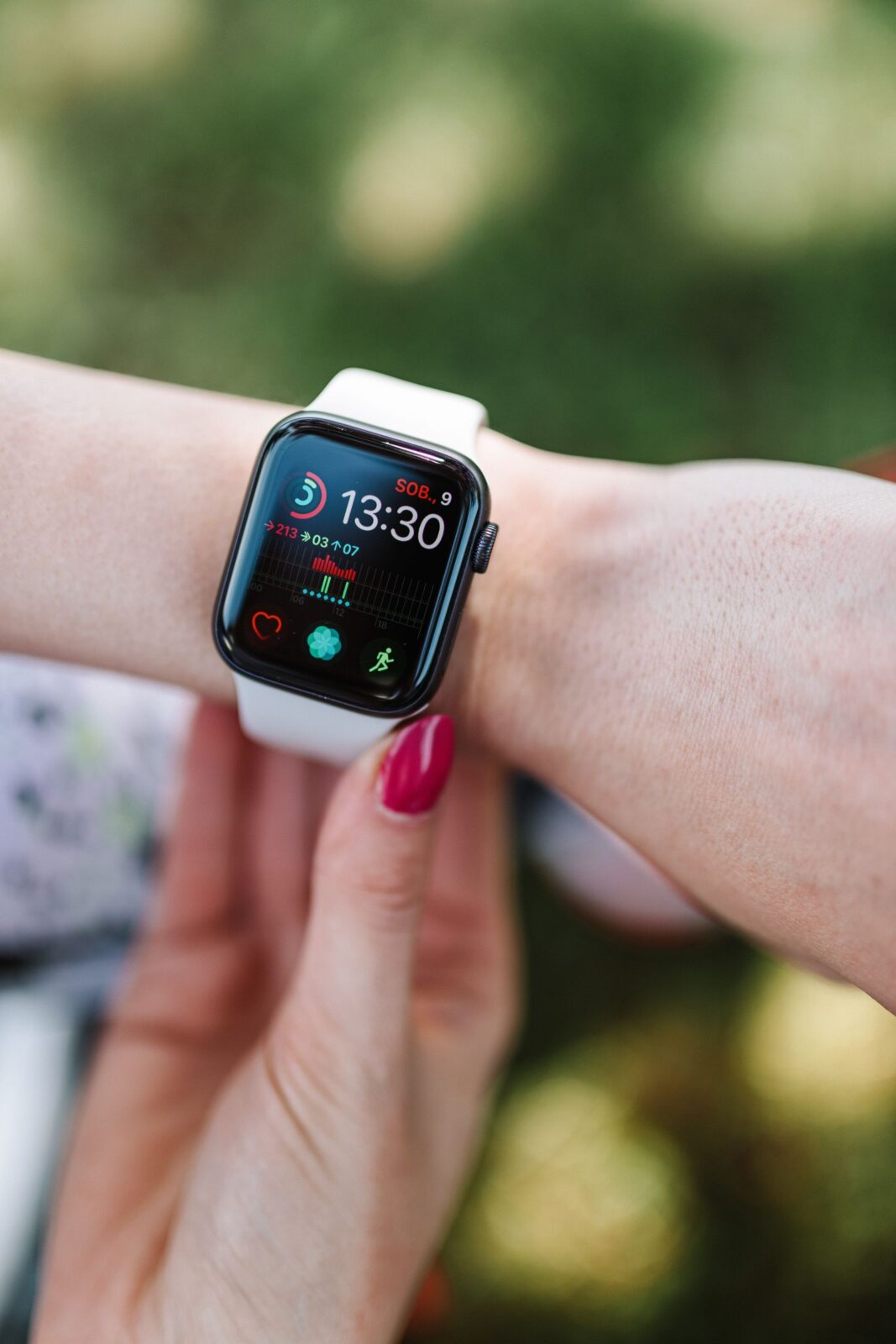 Close-up of a person checking a smartwatch on their wrist