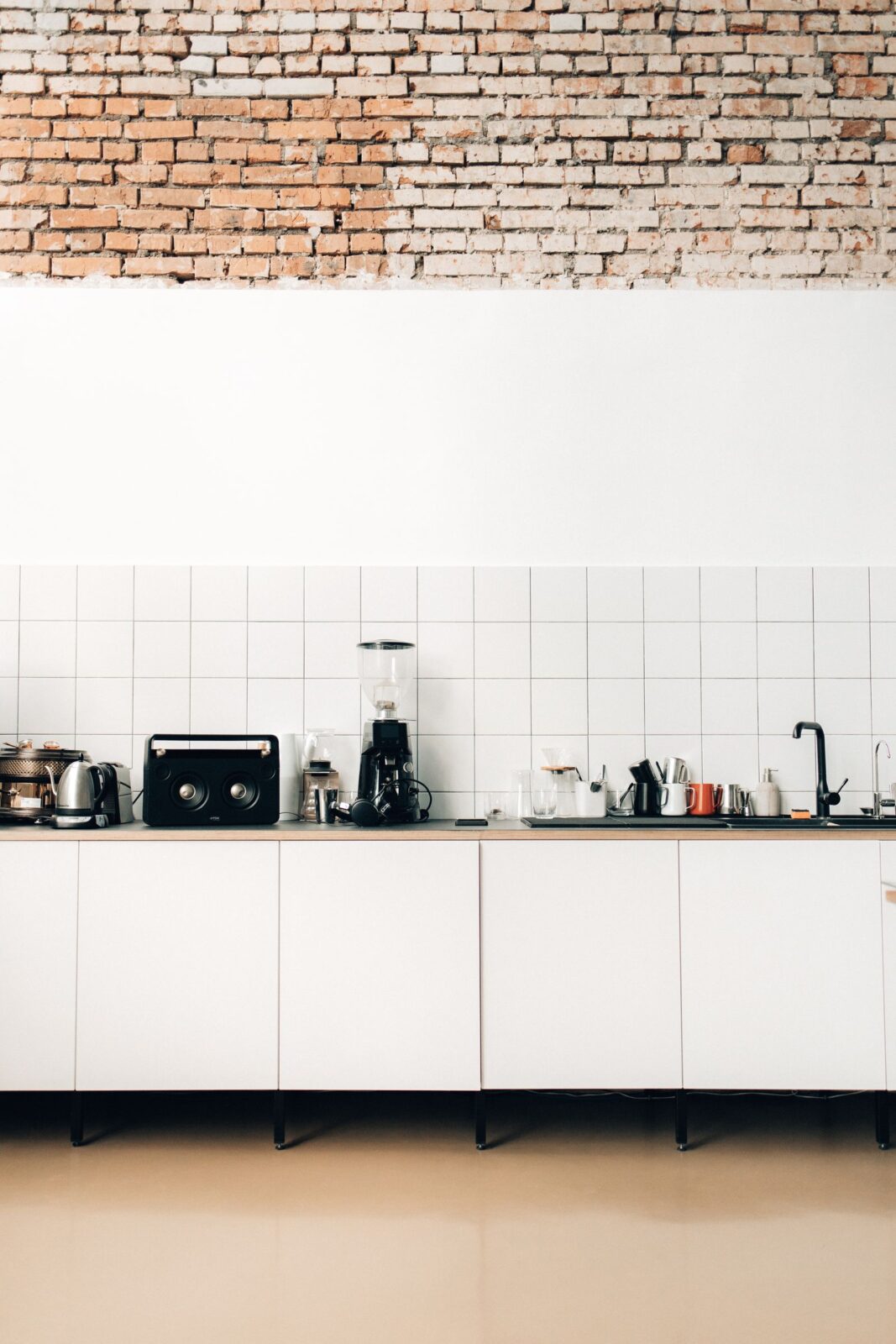 Small compact rice cooker on a tidy apartment kitchen counter