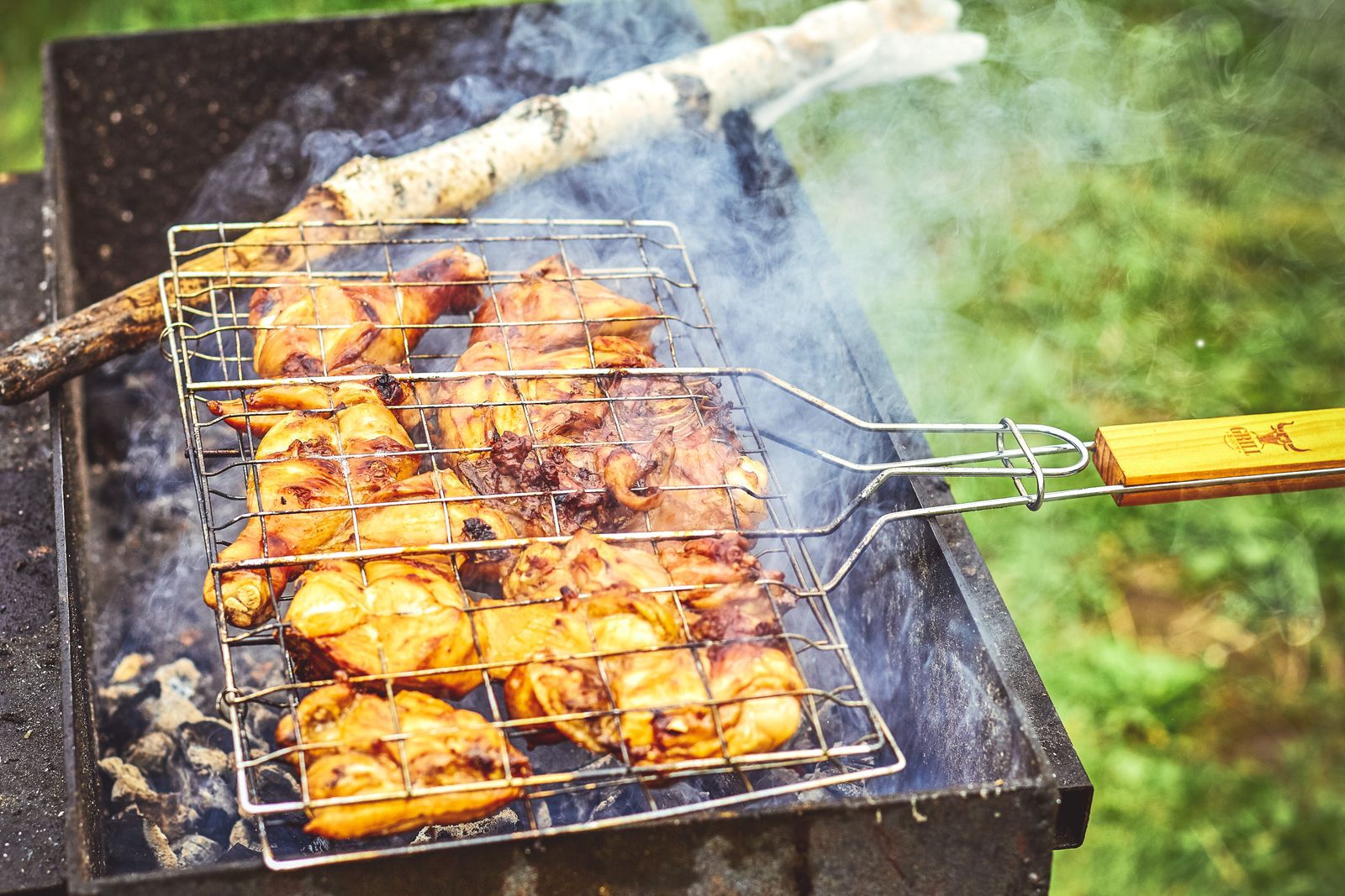 Barbecue chicken cooking on a grill