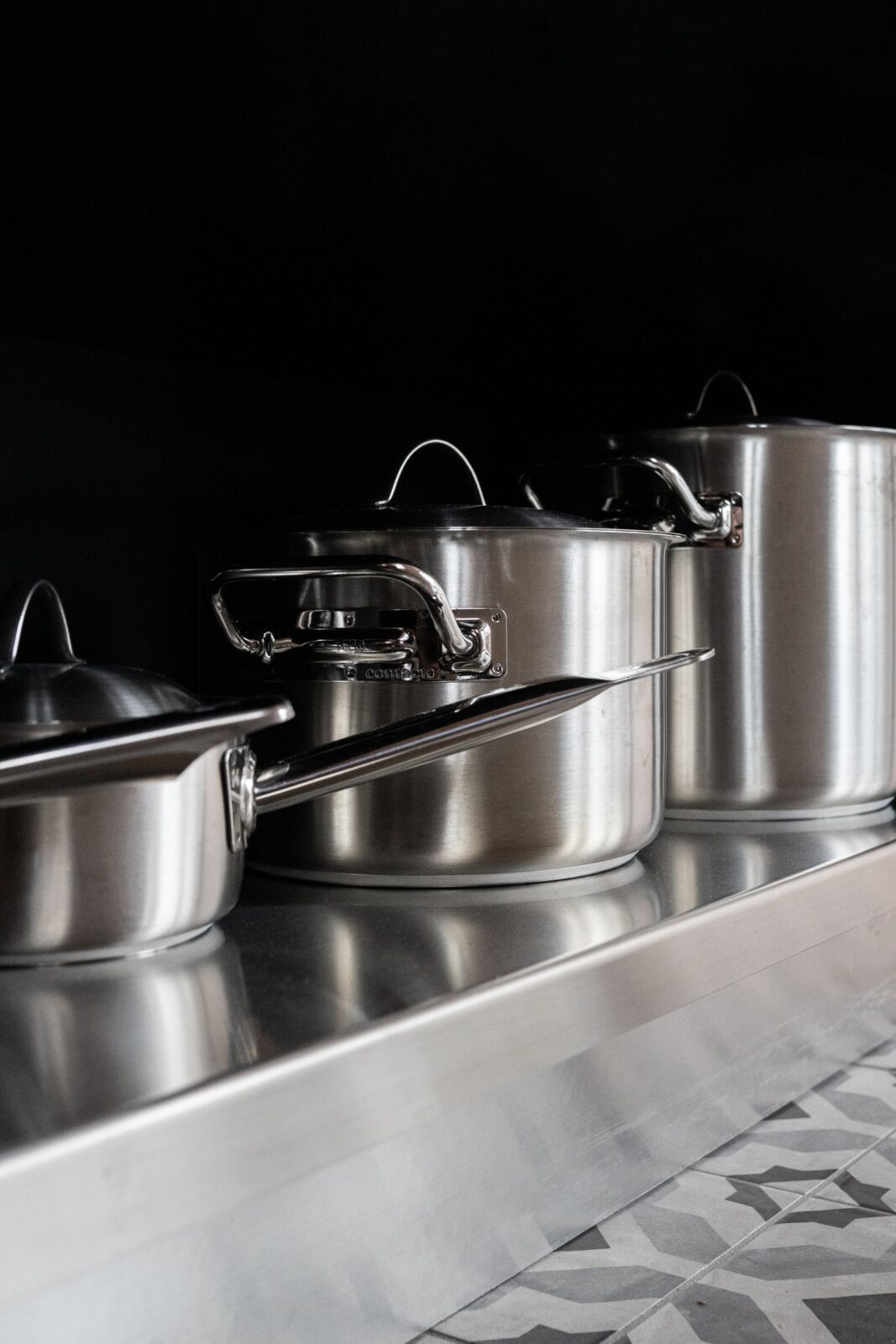 A set of stainless steel cooking pots
