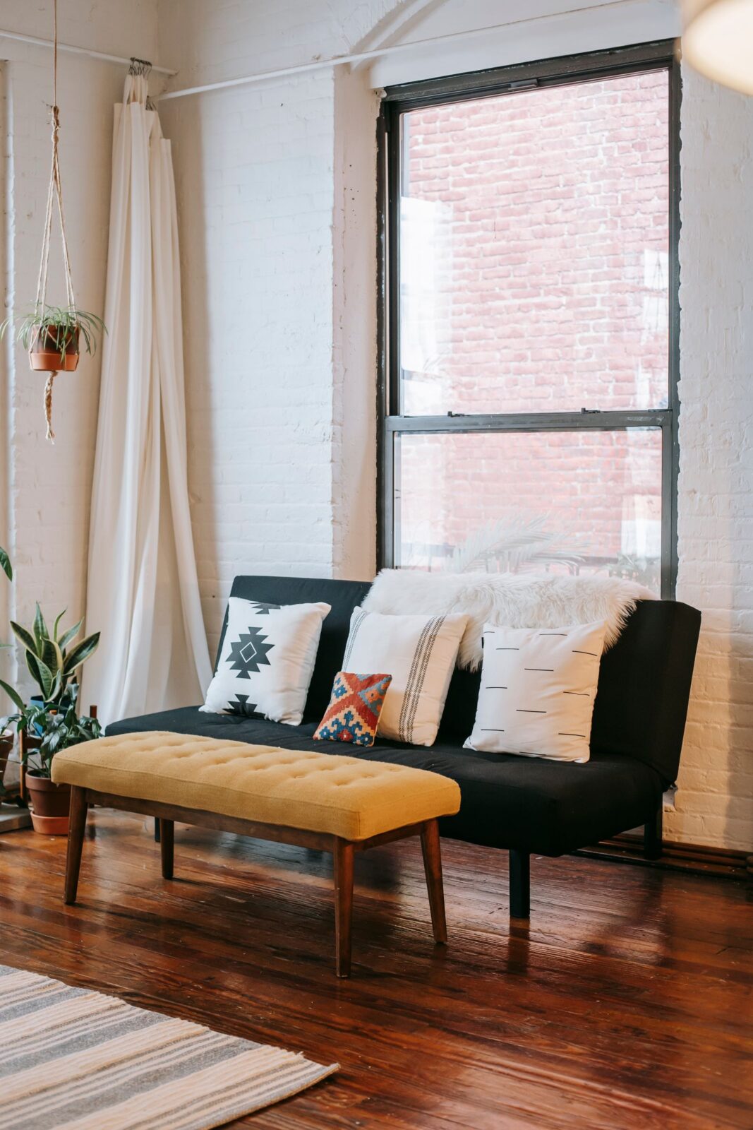 A cozy living room with a comfortable sofa