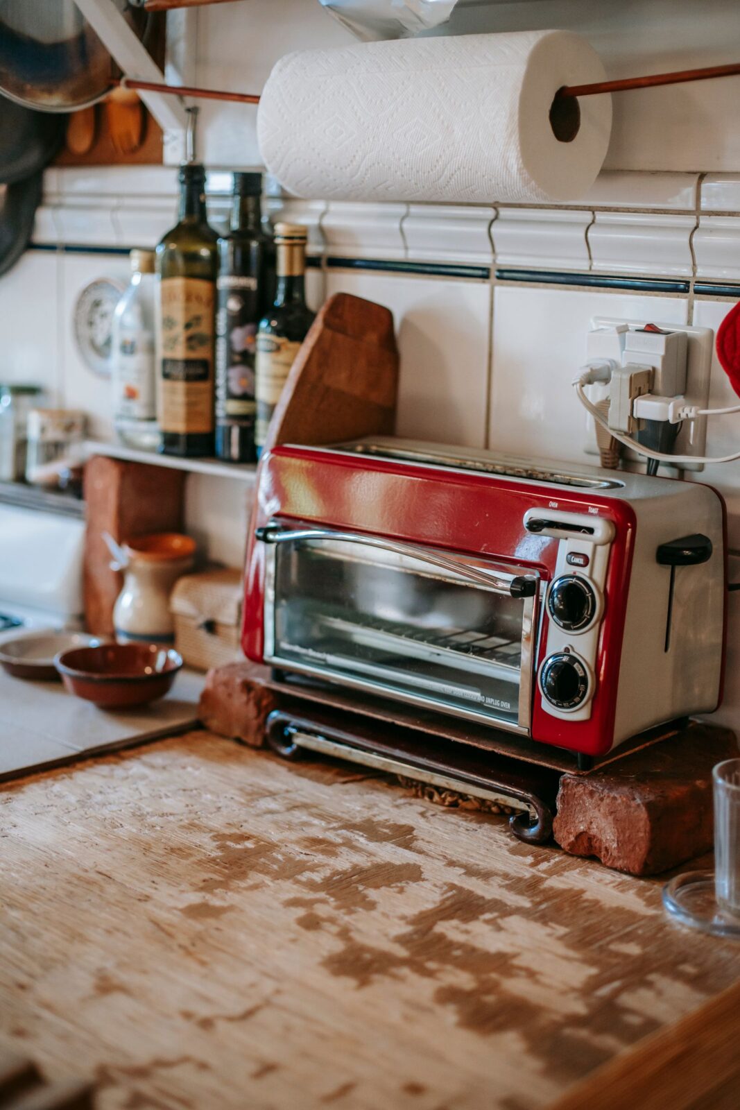 A modern countertop toaster oven with food inside