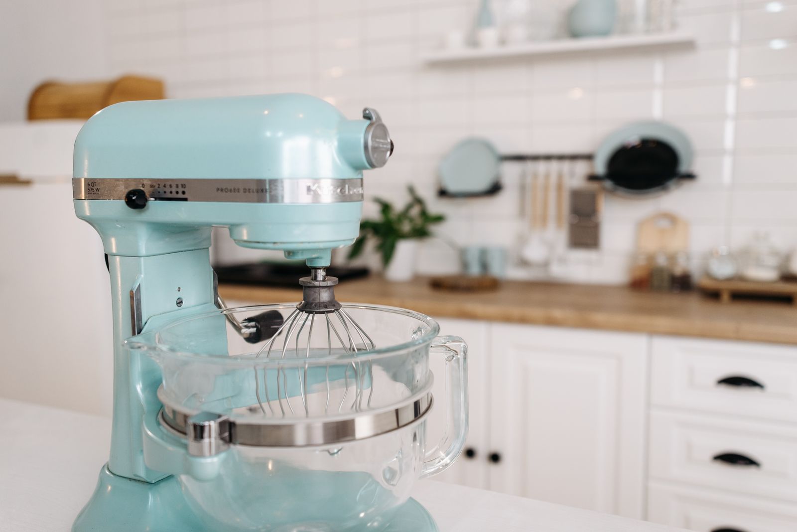 Stand mixer sitting on a kitchen table