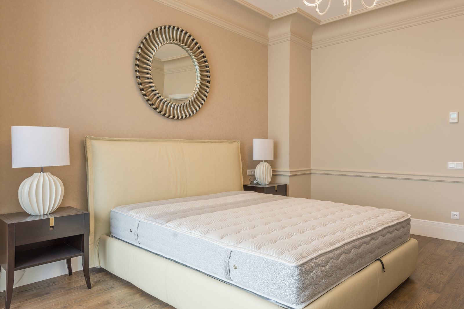 Comfortable mattress on a modern bed frame in a serene bedroom