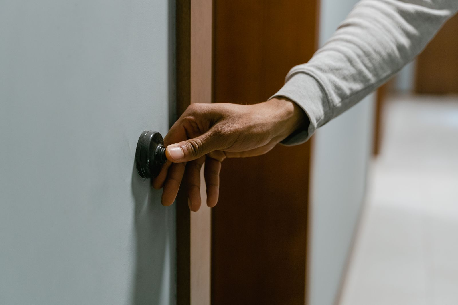 Smart video doorbell mounted beside a home front door