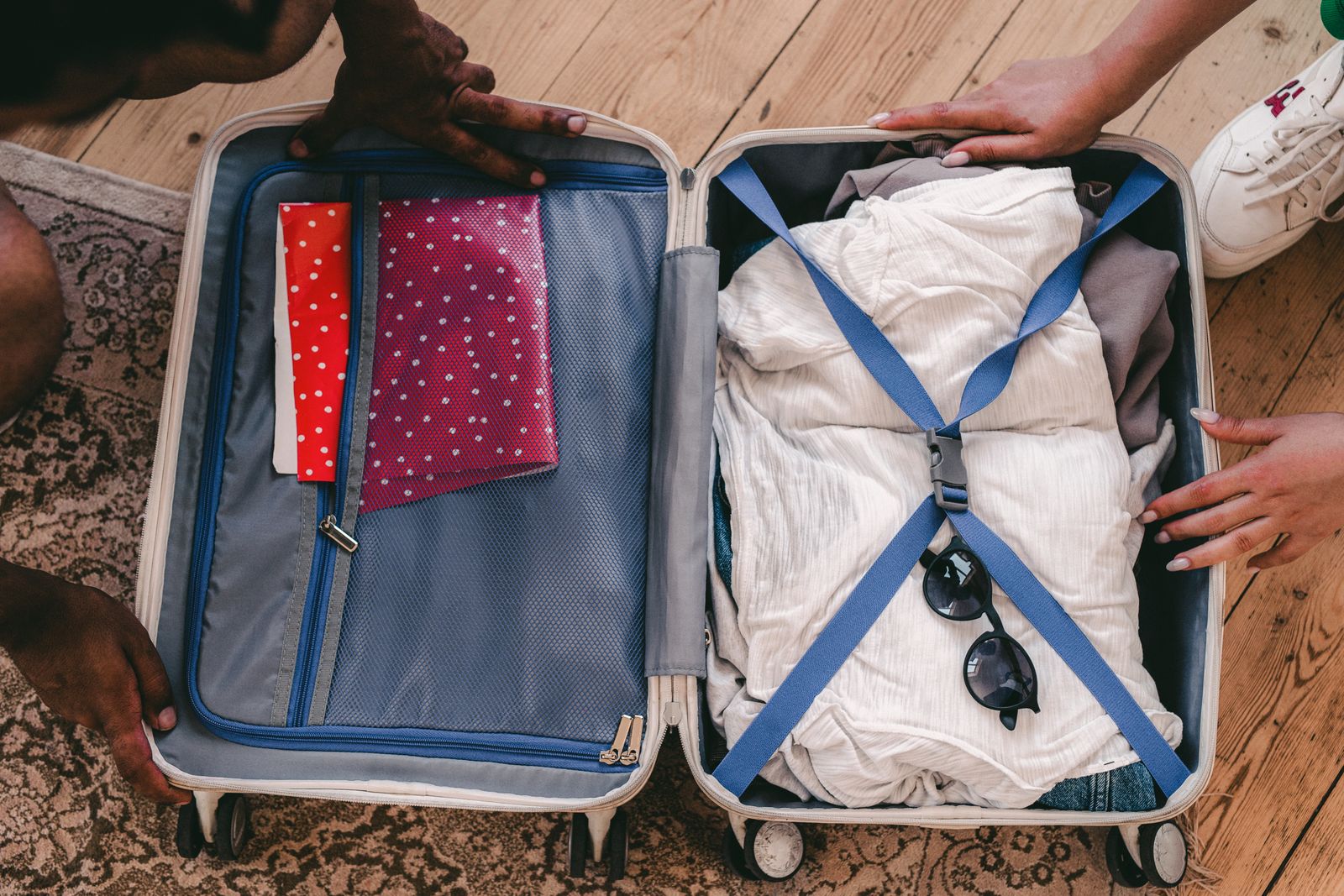 An open insulated medical travel case with an injection pen and gel cold packs