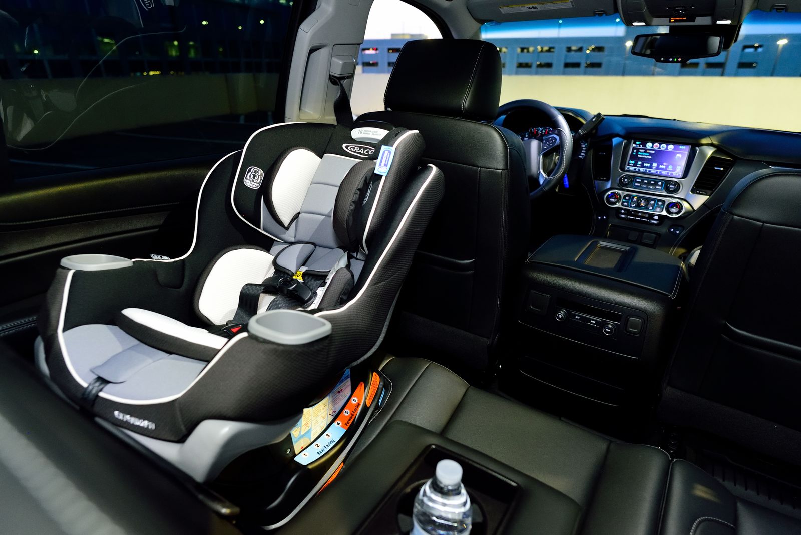 Convertible car seat installed rear-facing in a vehicle back seat