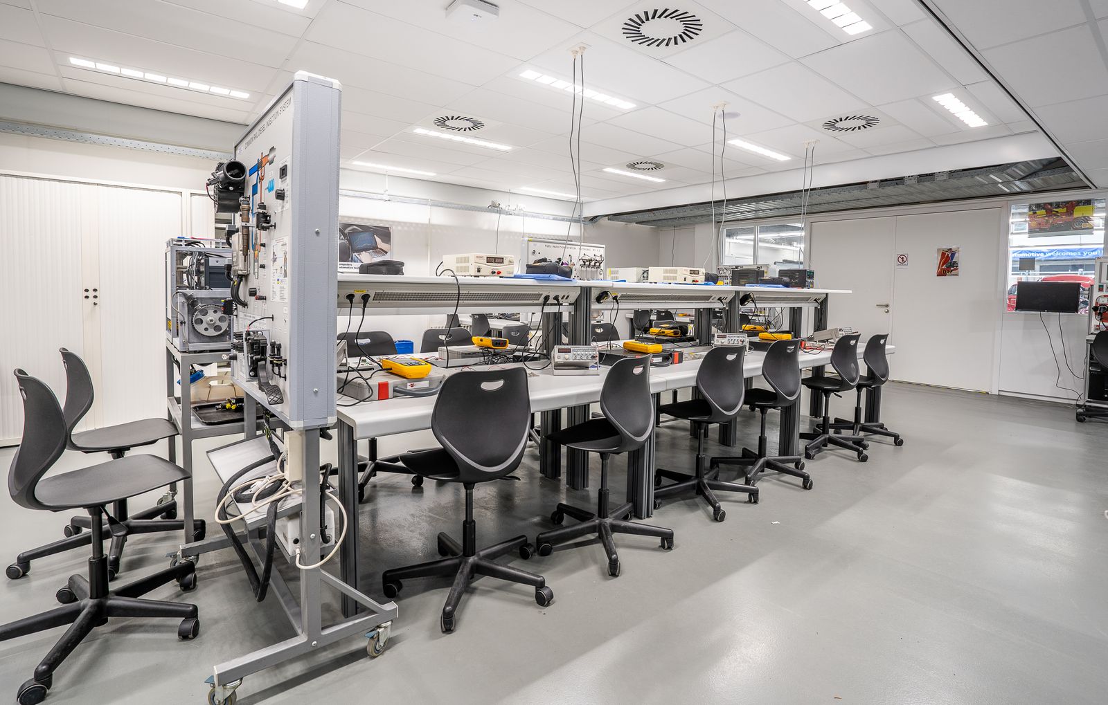 Spacious industrial workshop interior representing an uninsulated garage that needs heating
